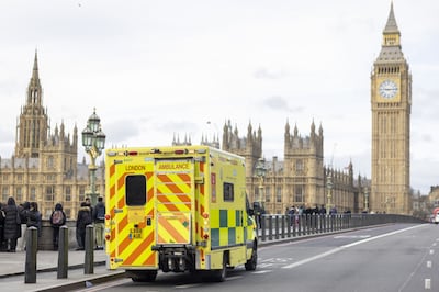 An ambulance crosses Westminster Bridge during a strike by junior doctors at St Thomas' Hospital in London, UK, on February 26. Bloomberg
