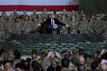 In this photo taken in November 2019, US President Donald Trump speaks to the troops at Bagram Air Field,in Afghanistan.  AFP 