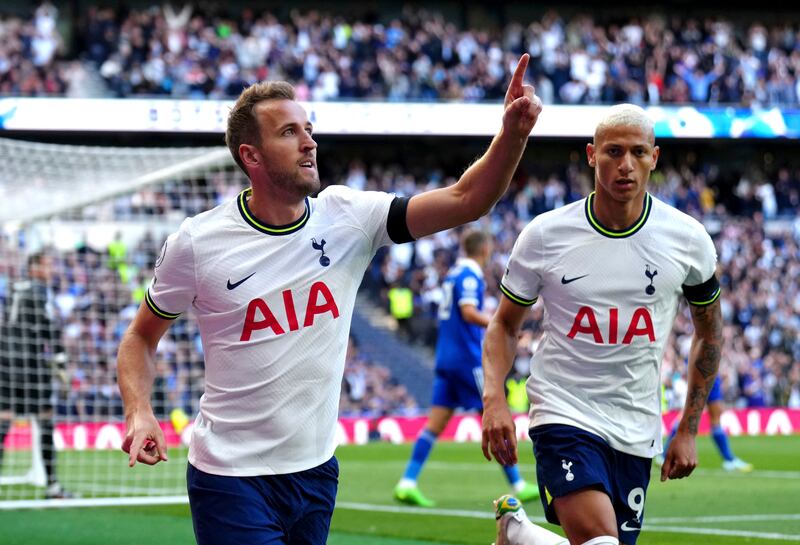 Harry Kane celebrates after heading Tottenham level at 1-1. AP 