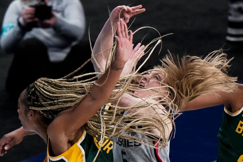 Baylor's DiJonai Carrington shoots past UConn's Paige Bueckers during the second half of their Elite Eight match-up at the Alamodome in San Antonio. AP