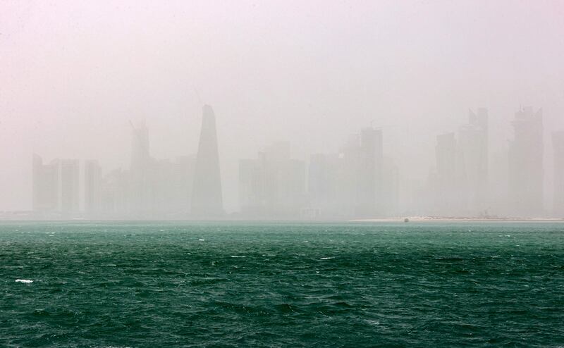 A view of the haze obscuring the skyline of Qatar's capital Doha during a heavy dust storm. AFP