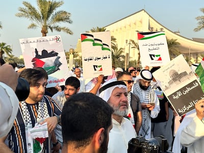Protesters gather in support of Palestinians near the parliament building in Kuwait City on October 7. Reuters