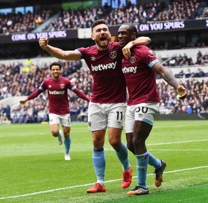 epa07531950 West Ham's Michail Antonio (R) celebrates with his teammate Robert Snodgrass (C) after scoring the 1-0 lead during the English Premier League soccer match between Tottenham Hotspur and West Ham United at the Tottenham Hotspur Stadium in London, Britain, 27 April 2019.  EPA/ANDY RAIN EDITORIAL USE ONLY. No use with unauthorized audio, video, data, fixture lists, club/league logos or 'live' services. Online in-match use limited to 120 images, no video emulation. No use in betting, games or single club/league/player publications.