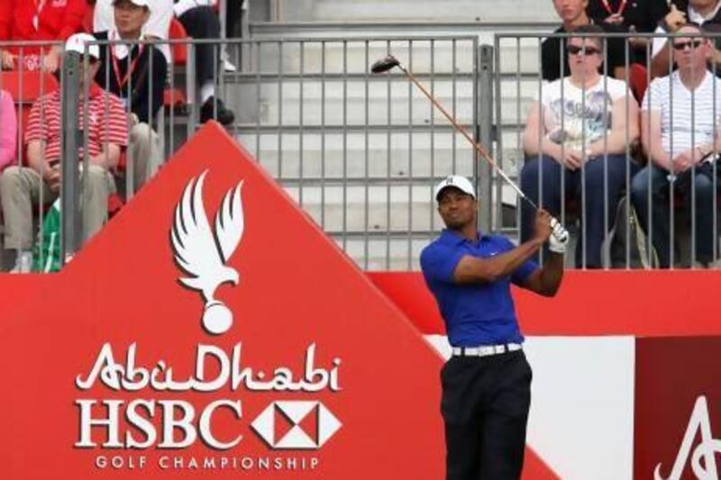 Tiger Woods was happy with how his 2012 season worked out so he plans to start 2013 the same way by playing in the Abu Dhabi HSBC Golf Championship.