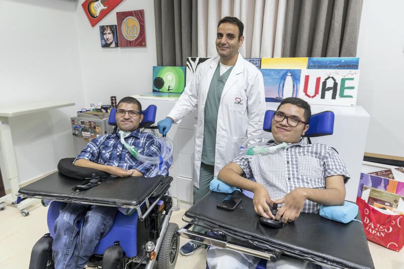 AI AIN, UNITED ARAB EMIRATES. 18 October 2017. Mohamead AlAlawi (20) and Mazen AlAlawi (24) who met for the first time at ProVita International Medical centre. They both have been sick for most of their lives and were previously getting treatment separately elsewhere. With them is Dr Umar Shah.. (Photo: Antonie Robertson/The National) Journalist: Shereena Al Nuwais. Section: National.