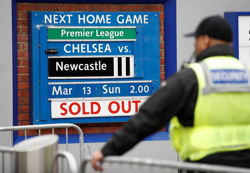 A board at Chelsea Football Club's stadium, Stamford Bridge, advises visitors that all tickets are sold out for the next game, versus Newcastle United, following Britain's imposing of sanctions on the club’s Russian owner, Roman Abramovich. Reuters