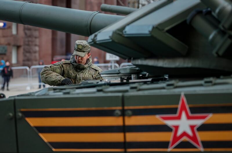 A Russian artilleryman in his vehicle on Tverskaya Street. EPA