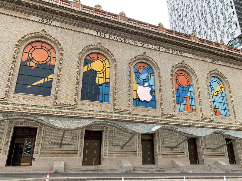 Apple Inc. signage is seen outside the Brooklyn Academy of Music (BAM) in the Brooklyn borough of New York, U.S., on Friday, Oct. 26, 2018. On Tuesday, the Cupertino, California-based technology giant will take the stage in Brooklyn, to unveil new Mac computers and iPad tablets. The theme of the event is "making," and it will take place at the Brooklyn Academy of Music -- both clues to how Apple plans to reignite sales of the products. Photographer: Bloomberg