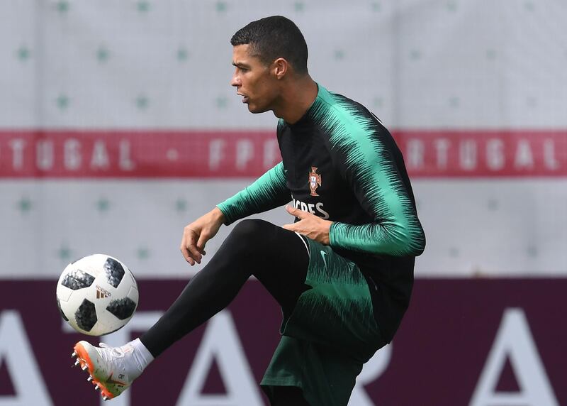 Cristiano Ronaldo controls the ball during a training session at their base camp in Kratovo, Moscow, Russia, on June 12, 2018. Francisco Leong / AFP