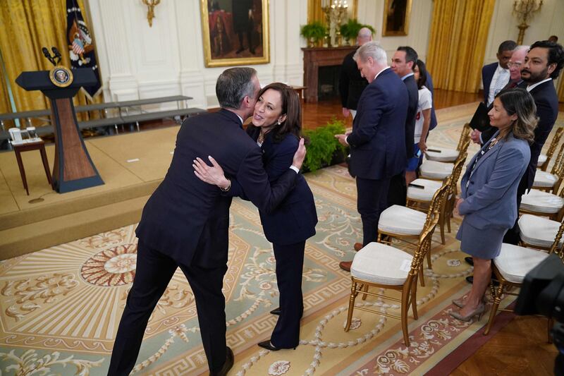 Kamala Harris greets Los Angeles Mayor Eric Garcetti during an event honouring the Los Angeles Dodgers and their 2020 World Series Championship in the East Room of the White House in Washington. AFP