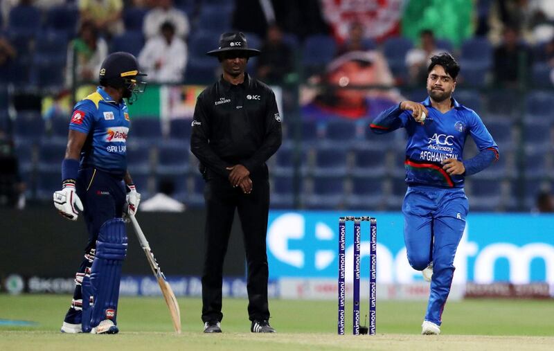 ABU DHABI , UNITED ARAB EMIRATES, September 17 , 2018 :- Rashid Khan of Afghanistan bowling during  the Asia Cup UAE 2018 cricket match between Afghanistan vs Sri Lanka at Sheikh Zayed Cricket Stadium in Abu Dhabi. ( Pawan Singh / The National )  For News/ Sports /Instagram. Story by Amith