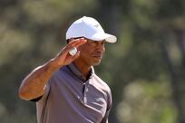 Tiger Woods keeps Masters dream alive in challenging conditions at Augusta