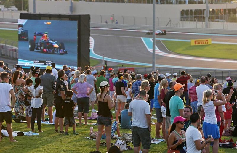 People watching the Formula 1 Etihad Airways Abu Dhabi Grand Prix from Abu Dhabi Hill at Yas Marina Circuit. Pawan Singh / The National