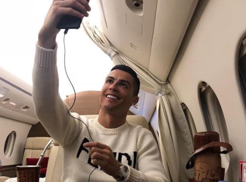 Cristiano Ronaldo takes a selfie on board a jet having been in Madrid for a court case. Courtesy @Cristiano/Twitter