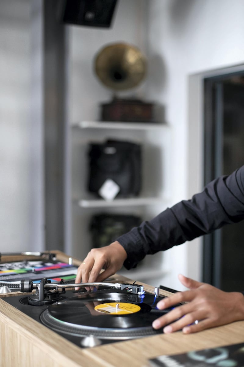Dubai, UNITED ARAB EMIRATES - FEBRUARY, 18 2019.

Jedd Peralta, works at  Dubai's vinyl record store – The Flip Side, in Al Serkal Avenue.

(Photo by Reem Mohammed/The National)

Reporter: 
Section:  NA