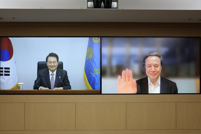South Korean President Yoon Suk-yeol holds a virtual meeting with Mr Musk. EPA