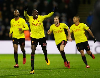 WATFORD, ENGLAND - DECEMBER 26:  Abdoulaye Doucoure of Watford celebrates the own goal scored by Kasper Schmeichel of Leicester City with team mates during the Premier League match between Watford and Leicester City at Vicarage Road on December 26, 2017 in Watford, England.  (Photo by Henry Browne/Getty Images)