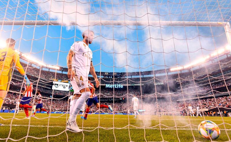 Real Madrid's Spanish defender Sergio Ramos reacts after one of Atletico's seven goals. AFP