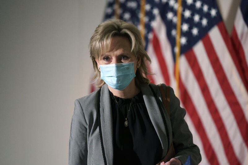 Sen. Cindy Hyde-Smith, arrives to meet with other Senate Republicans during a rare weekend session to advance the confirmation of Amy Coney Barrett to the Supreme Court, at the Capitol in Washington. AP Photo