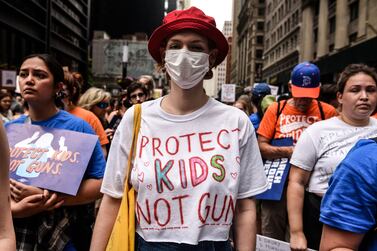 Demonstrators during a March For Our Lives in New York, U. S, on Saturday, June 11, 2022.  In the wake of the May massacre at Robb Elementary School in Uvalde, Texas, and other recent mass shootings, students and activists have continued to stage walkouts and rallies to demand change. Photographer: Stephanie Keith / Bloomberg 