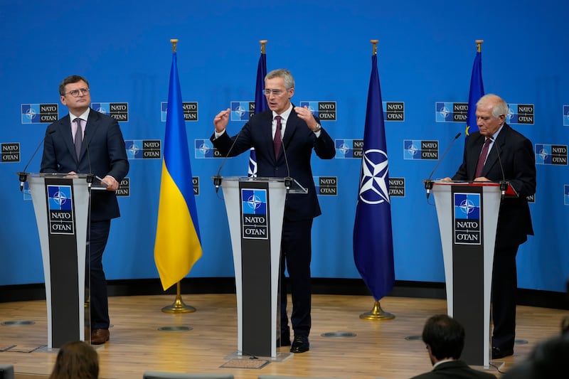 From left, Ukraine's Foreign Minister Dmytro Kuleba, Nato Secretary General Jens Stoltenberg and EU foreign policy chief Josep Borrell in Brussels. AP