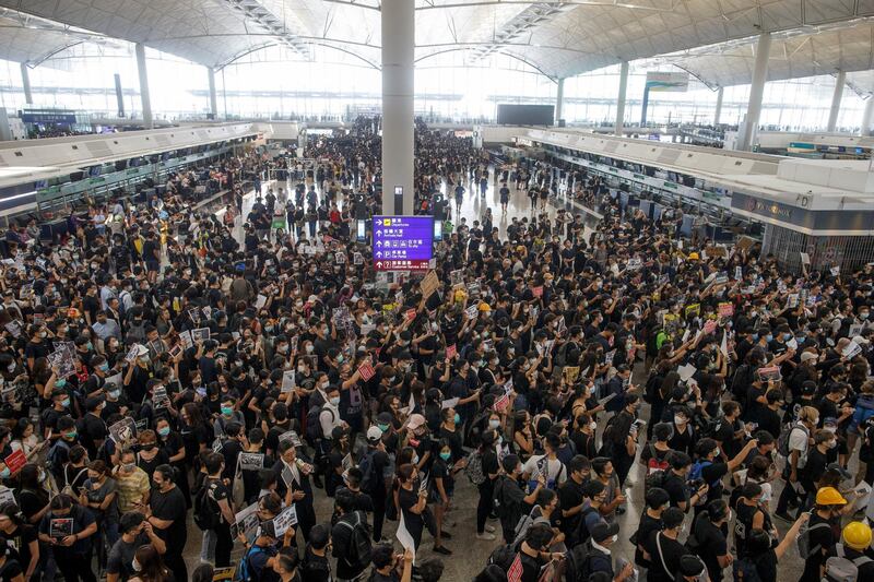 Anti-extradition bill protesters rally at the departure hall of Hong Kong airport in Hong Kong, China.  Reuters