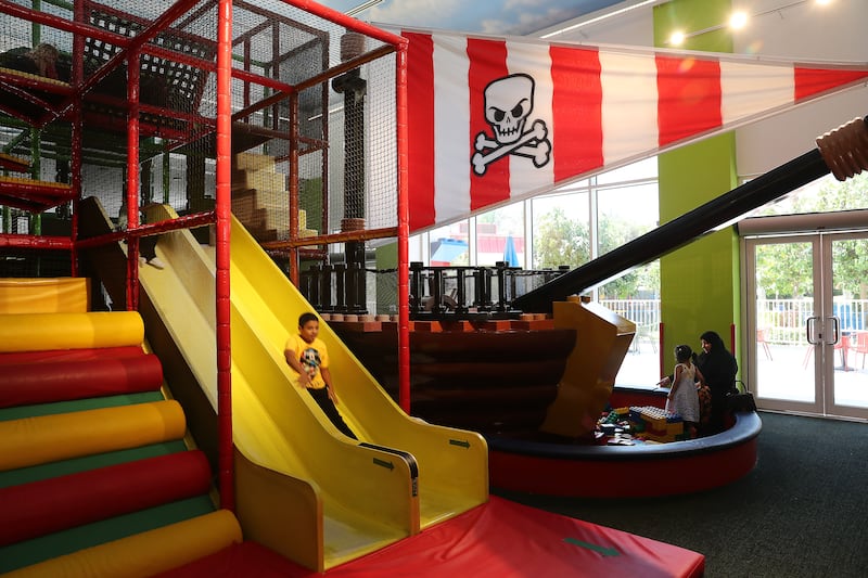 A soft-play jungle gym at the entrance of the restaurant 