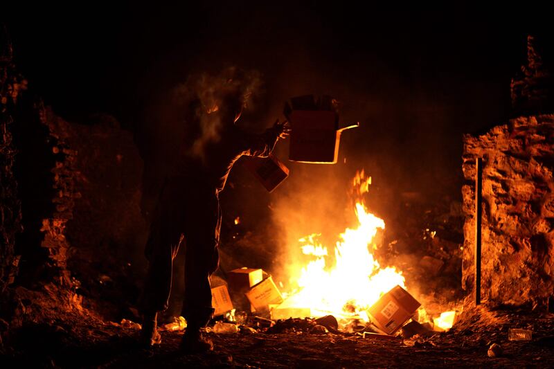 Trash at a burn pit in Forward Operating Base Zeebrudge, Helmand province, Afghanistan. US Marines / AFP