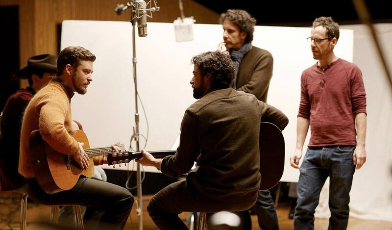 From left, Justin Timberlake, Oscar Isaac and the film-makers Joel and Ethan Coen during the filming of Inside Llewyn Davis. Courtesy Studio Canal