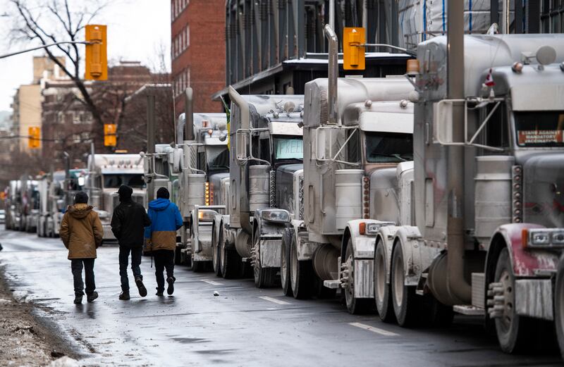 Lorries are parked on Metcalfe Street during a rally against Covid-19 restrictions in Ottawa, Canada. AP