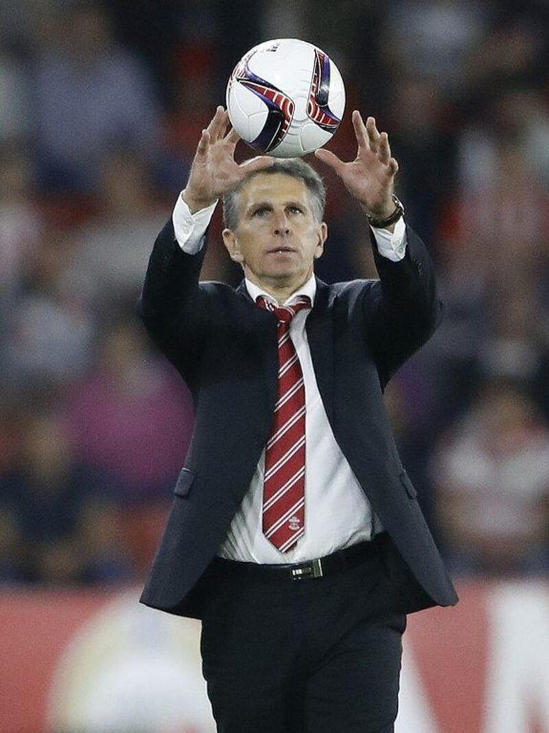 Southampton manager Claude Puel catches a ball during the Europa League match against Sparta Prague. Frank Augstein / AP Photo