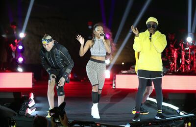 From left, Taboo, J Rey Soul, will.i.am of the Black Eyed Peas at a 2021 concert in front of the pyramids. EPA