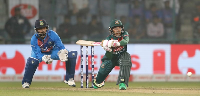 Bangladesh's Bangladesh's Mustafiqur Rahim plays a shot against India during the first T20 cricket match at the Arun Jaitley stadium, in New Delhi, India, Sunday, Nov. 3, 2019. (AP Photo/Manish Swarup)