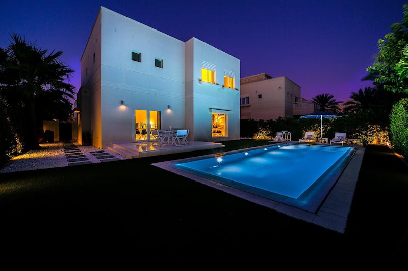 The villa glows as dusk arrives. Courtesy LuxuryProperty.com