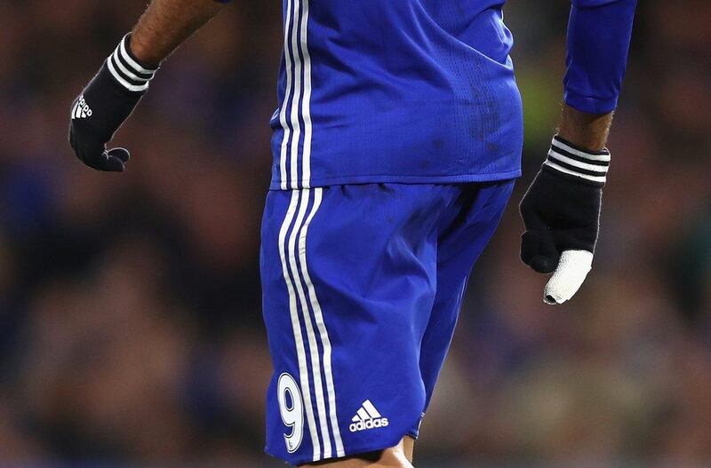 Diego Costa of Chelsea with a bandge on his fingers during the match. Clive Rose / Getty Images