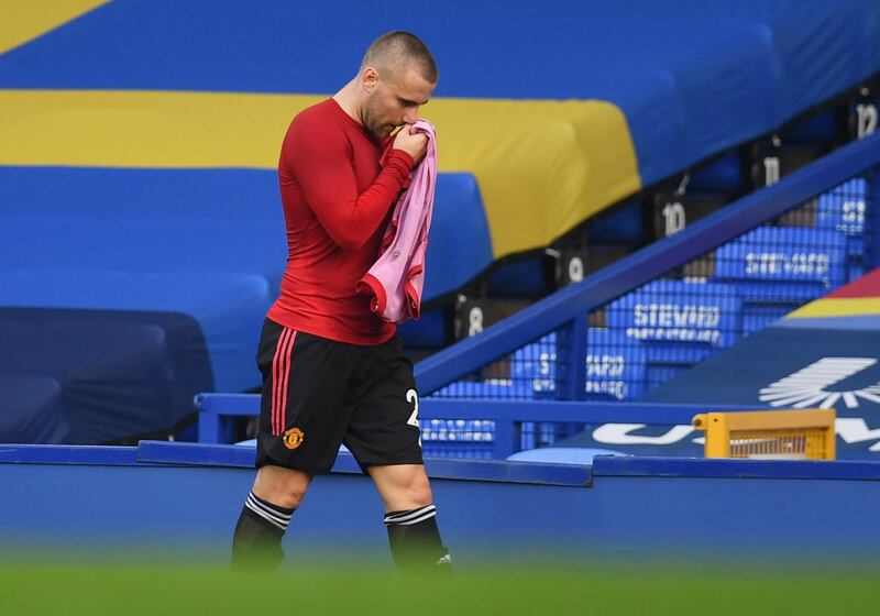 Soccer Football - Premier League - Everton v Manchester United - Goodison Park, Liverpool, Britain - November 7, 2020 Manchester United's Luke Shaw walks off the pitch after being substituted Pool via REUTERS/Paul Ellis EDITORIAL USE ONLY. No use with unauthorized audio, video, data, fixture lists, club/league logos or 'live' services. Online in-match use limited to 75 images, no video emulation. No use in betting, games or single club /league/player publications.  Please contact your account representative for further details.