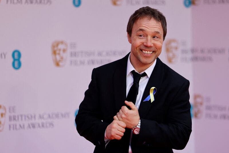 (FILES) In this file photo taken on March 13, 2022 British actor Stephen Graham poses on the red carpet upon arrival at the BAFTA British Academy Film Awards at the Royal Albert Hall, in London.  - British actor Stephen Graham, is one of 1,107 people who have been awarded this year in a list signed for the first time by King Charles III.  These royal awards are given twice a year, on New Year's Day and on the King's official birthday, always celebrated in June, regardless of the monarch's actual date of birth (14 November 1948 for Charles III).  (Photo by Tolga Akmen  /  AFP)