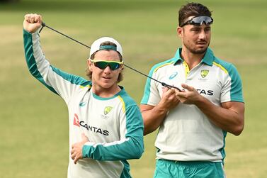 MELBOURNE, AUSTRALIA - MARCH 22: Adam Zampa and Marcus Stoinis of Australia warm up during a training session ahead of the ODI & T20 tour of Pakistan at Junction Oval on March 22, 2022 in Melbourne, Australia. (Photo by Quinn Rooney / Getty Images)