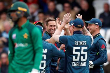 England's Chris Woakes celebrates with teammates after taking the wicket of Pakistan's Fakhar Zaman at Headingley. Reuters