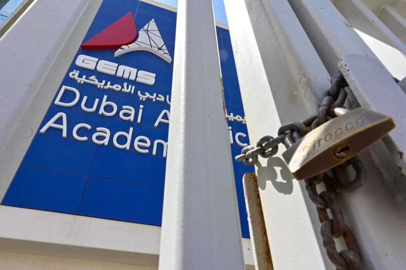 A school gate is closed with a chain and lock in Dubai. AFP