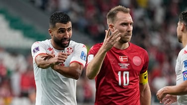 Tunisia's Ali Abdi, left, complains to the referee as Denmark's Christian Eriksen reacts during the World Cup group D soccer match between Denmark and Tunisia, at the Education City Stadium in Al Rayyan, Qatar, Tuesday, Nov.  22, 2022.  (AP Photo / Ariel Schalit)