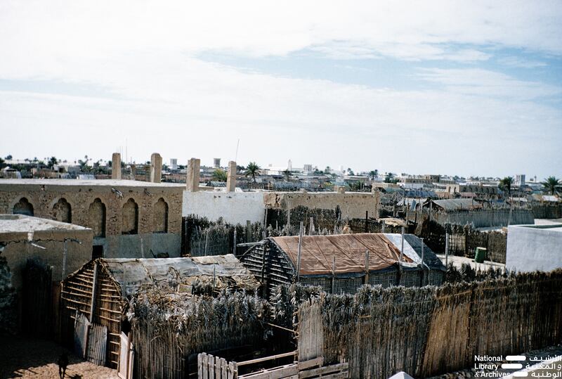 A view of Abu Dhabi showing the various architectural styles including barasti, coral stone and brick dwellings. Photo: Dr Alan Horan © UAE National Library and Archives