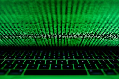 FILE PHOTO: A computer keyboard lit by a displayed cyber code is seen in this illustration picture taken on March 1,  2017. REUTERS/Kacper Pempel/Illustration/File Photo