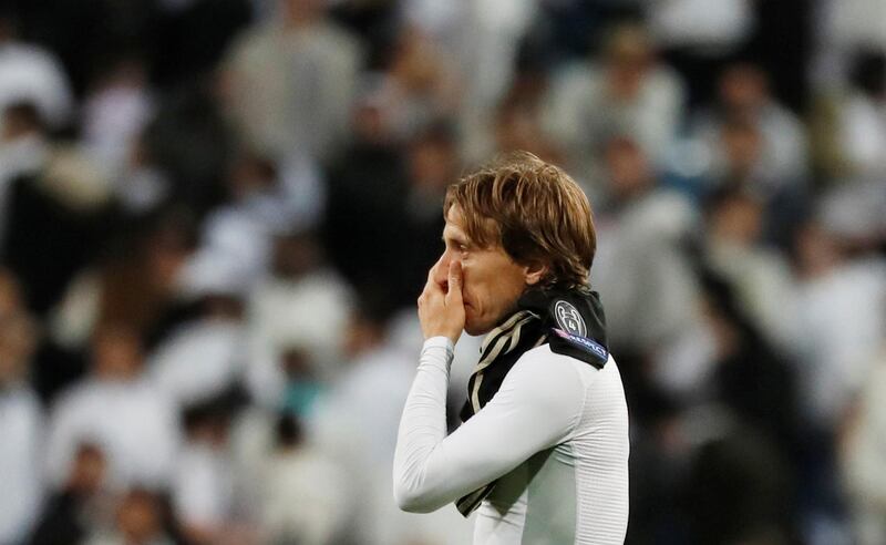 Real Madrid's Luka Modric looks dejected at the end of the match. Reuters