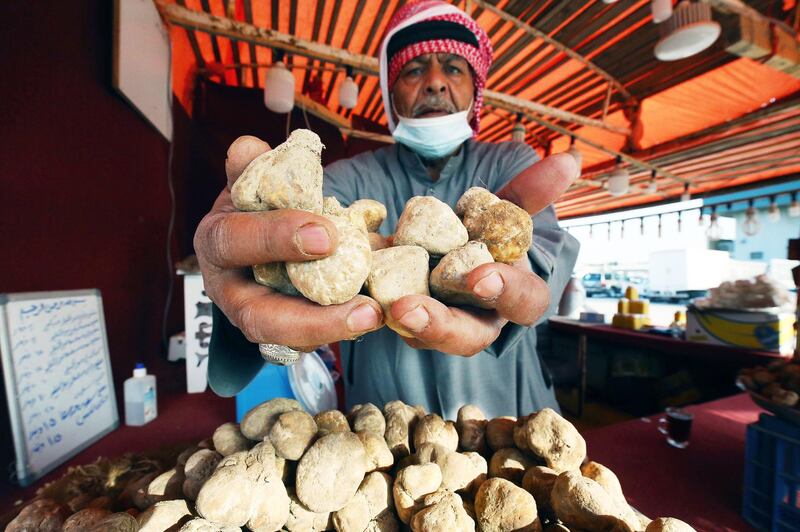 A Kuwaiti vendor displays desert truffles at a market in the capital Kuwait City. The desert truffle, an underground fungus, is unique to arid environments. AFP