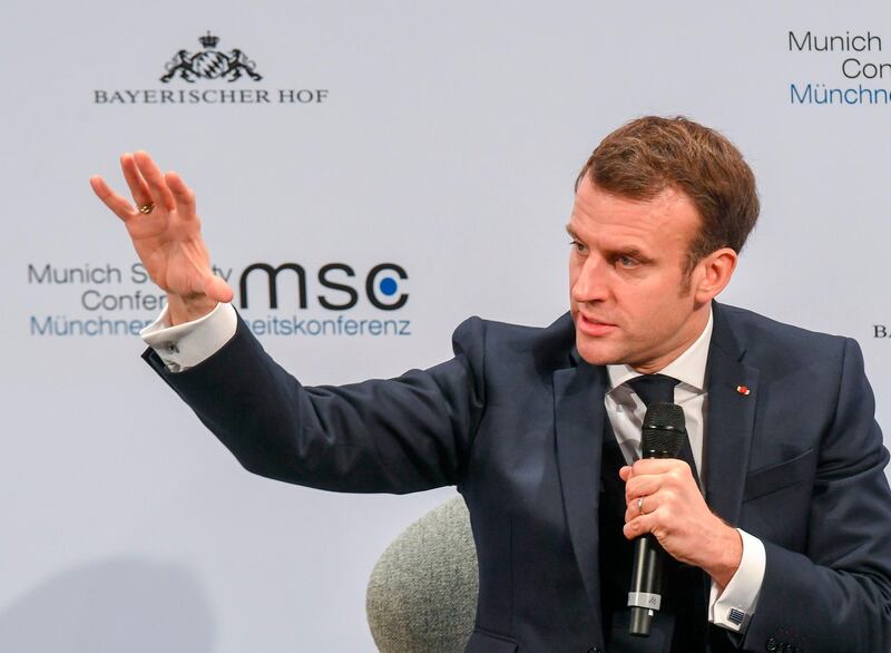 France's President Emmanuel Macron addresses the audience on the podium during the 56th Munich Security Conference (MSC) in Munich, southern Germany.  AFP