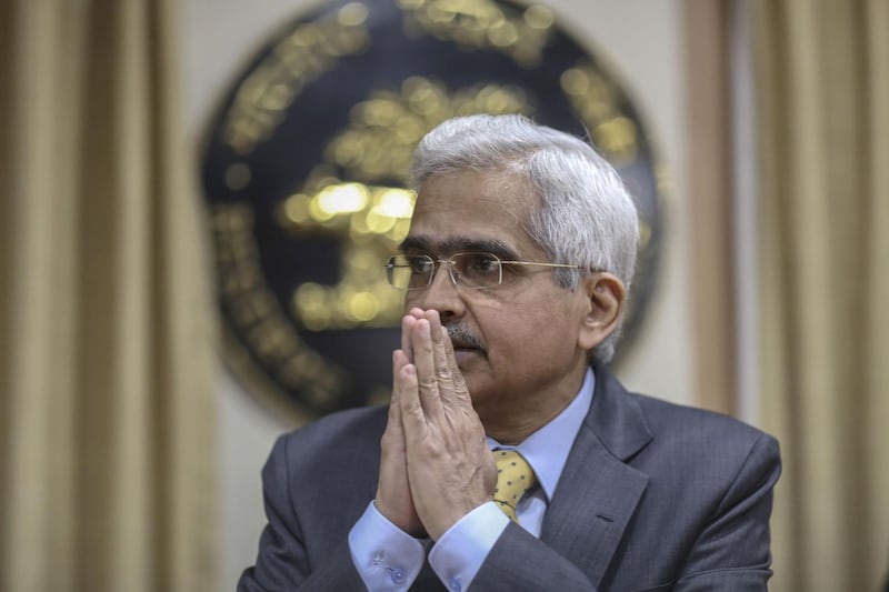 Shaktikanta Das, governor of the Reserve Bank of India (RBI), gestures during a news conference in Mumbai, India, on Thursday, Feb. 6, 2020. India's central bank left interest rates unchanged for a second straight meeting, while keeping the door open for more easing to support the economy when inflation eases. Photographer: Dhiraj Singh/Bloomberg