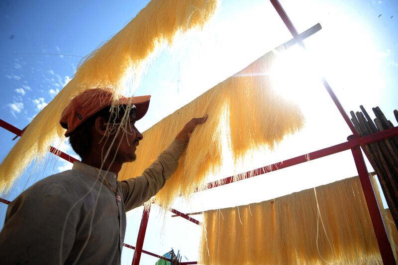 Vermicelli being made in Hyderabad, Pakistan. The pasta is used in the production of seviyan, a pudding that is especially popular during Ramadan. EPA 
