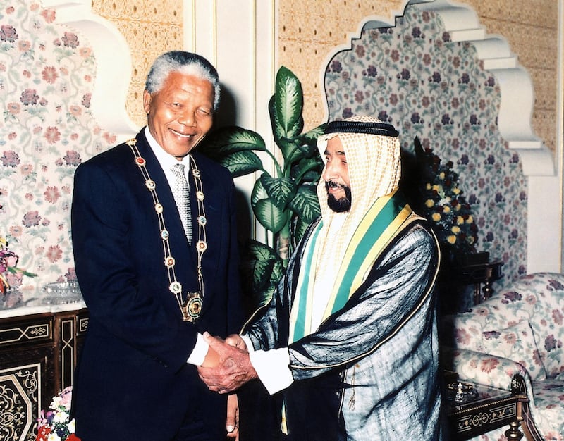 Sheikh Zayed Bin Sultan Al Nahyan awarding the ‘Zayed Medal of Honor’ to Nelson Mandela during his first visit to the UAE in 1998, and Nelson Mandela awarding Sheikh Zayed the highest honour of South Africa at Al Mushrif Palace, 11th April  1995
Source: WAM 
National Archives images supplied by the Ministry of Presidential Affairs to mark the 50th anniverary of Sheikh Zayed Bin Sultan Al Nahyan becaming the Ruler of Abu Dhabi. *** Local Caption ***  86 a.jpg