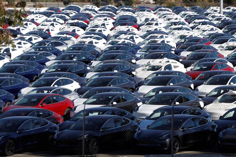 FILE PHOTO:  A parking lot of predominantly new Tesla Model 3 electric vehicles is seen in Richmond, California, U.S. June 22, 2018.   REUTERS/Stephen Lam/File Photo